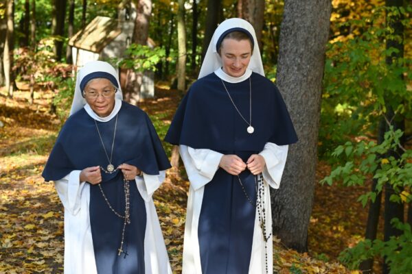 SRJ+SCaMpraying the rosary outside